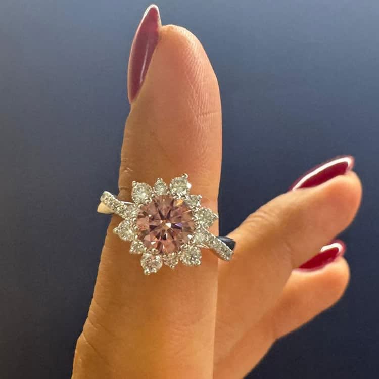 Fancy vivid pink diamond ring