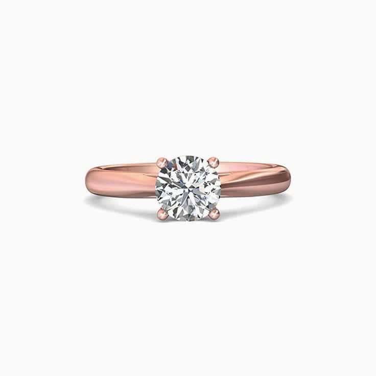 Solitaire in cathedral setting engagement ring