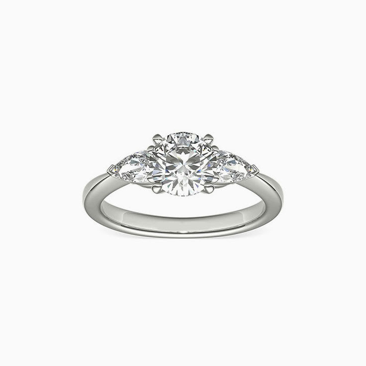 Brilliant Round And Pear Diamond Engagement Ring