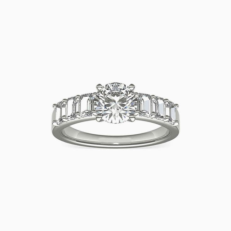 Brilliant Round And Emerald Cut Diamond Engagement Ring
