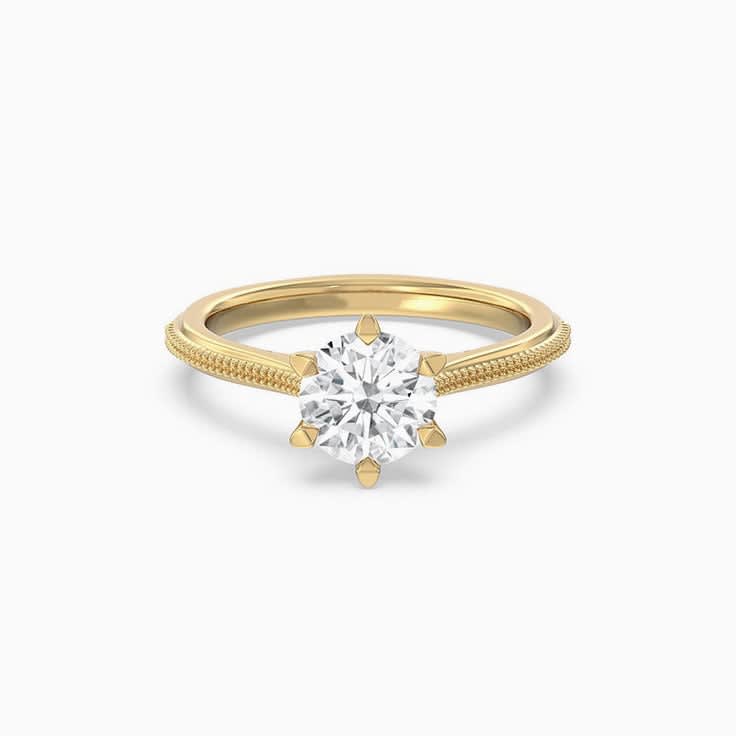 Unique engagement ring with round diamond