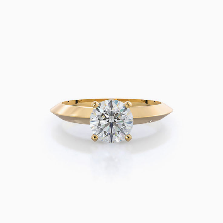 Knife edge engagement ring with round diamond