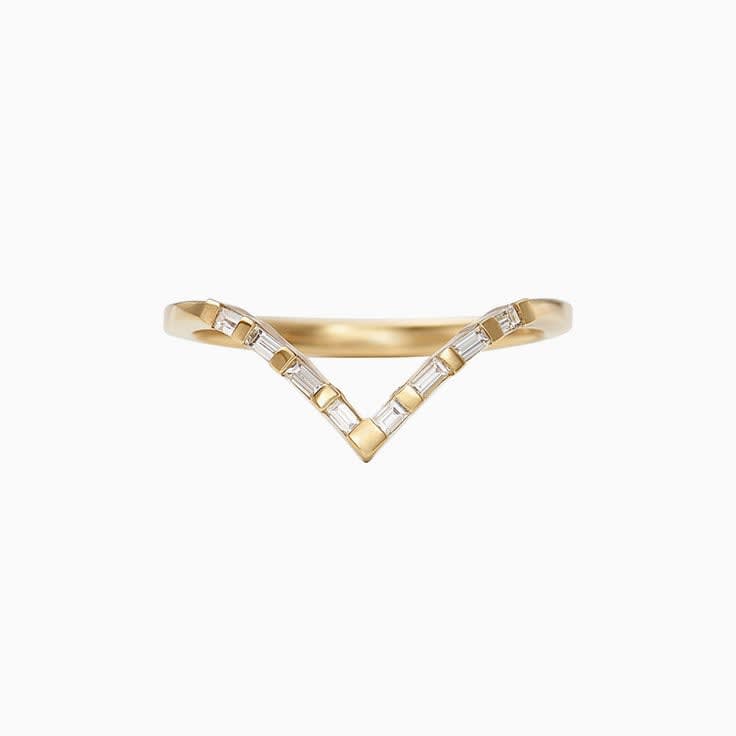 Crown wedding band with baguette diamonds