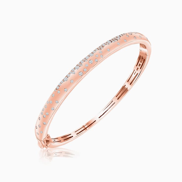 Gold bangle with diamonds