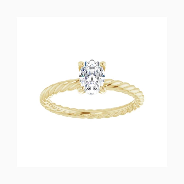 Oval engagement ring with twisted band