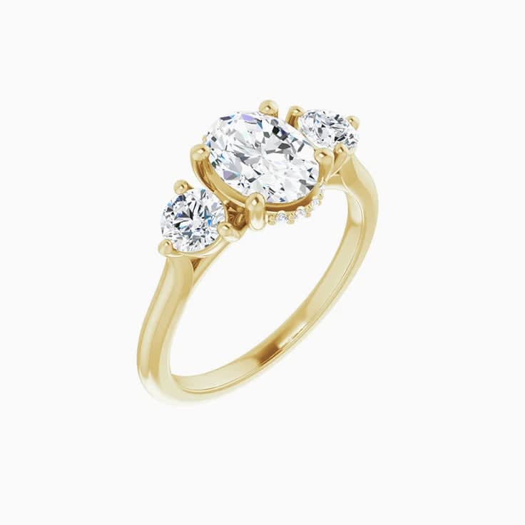 Oval trilogy engagement ring