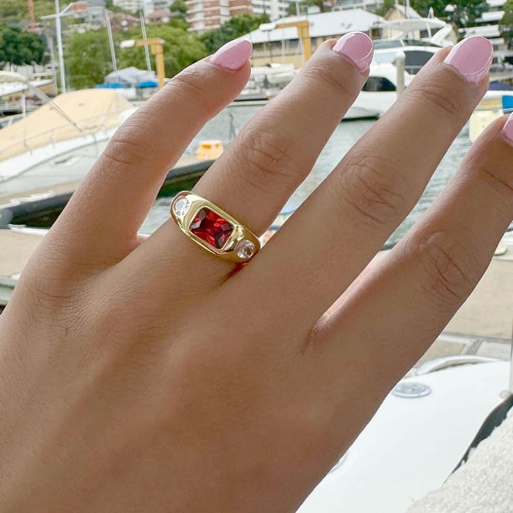 Garnet And Oval Gold Ring