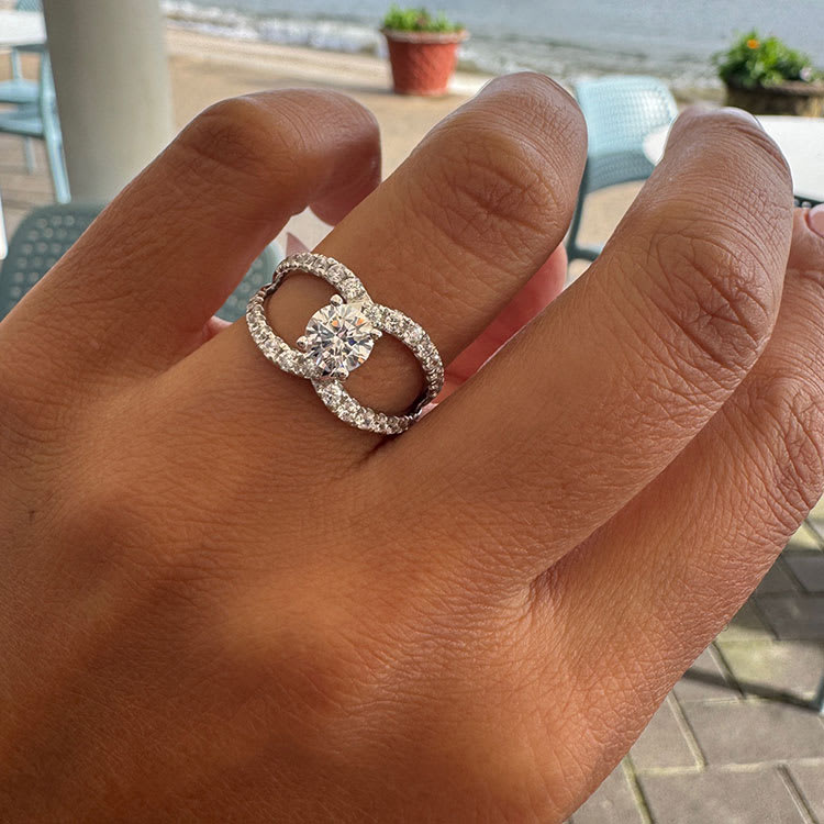 Crossover diamond engagement ring