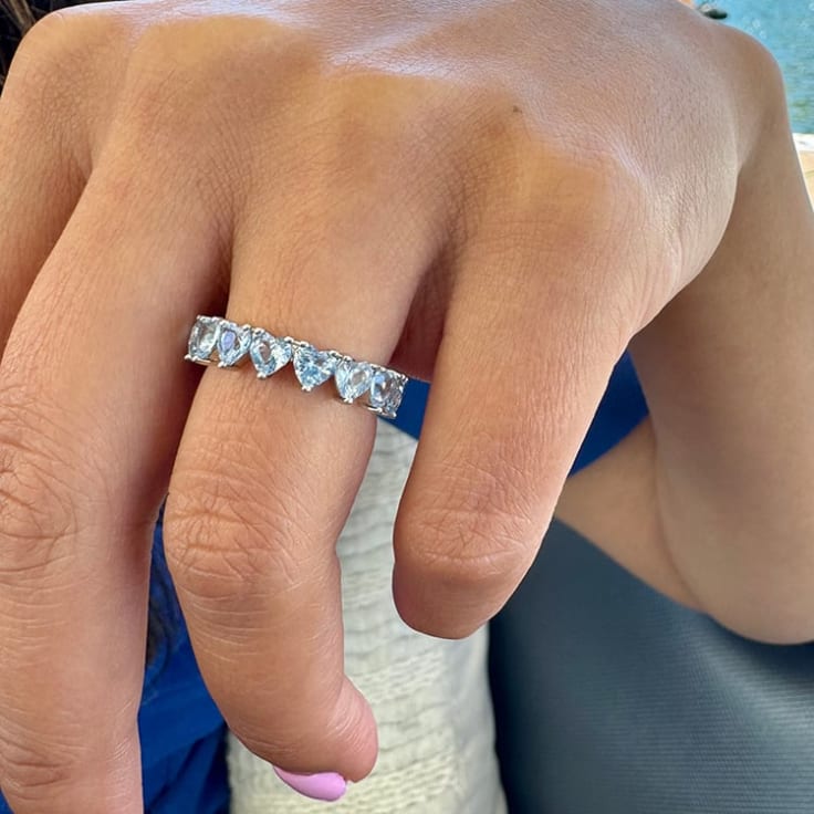 Blue topaz eternity ring