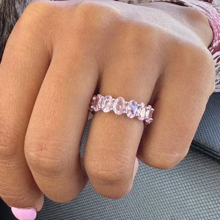 Oval eternity ring with baby pink gemstone
