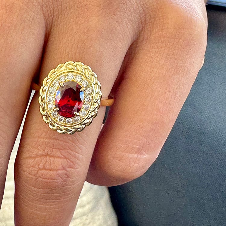 Oval garnet patterned ring