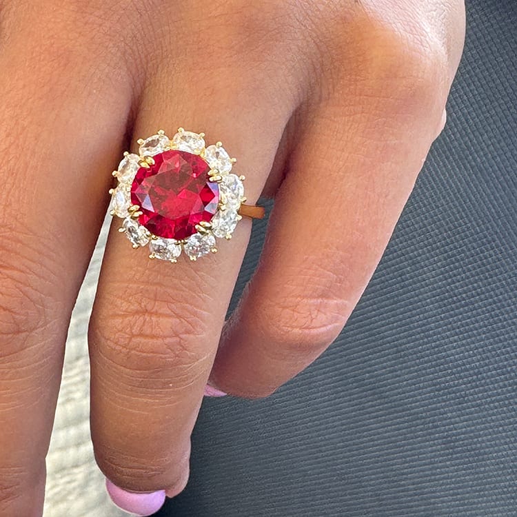 Round Ruby with oval lab halo