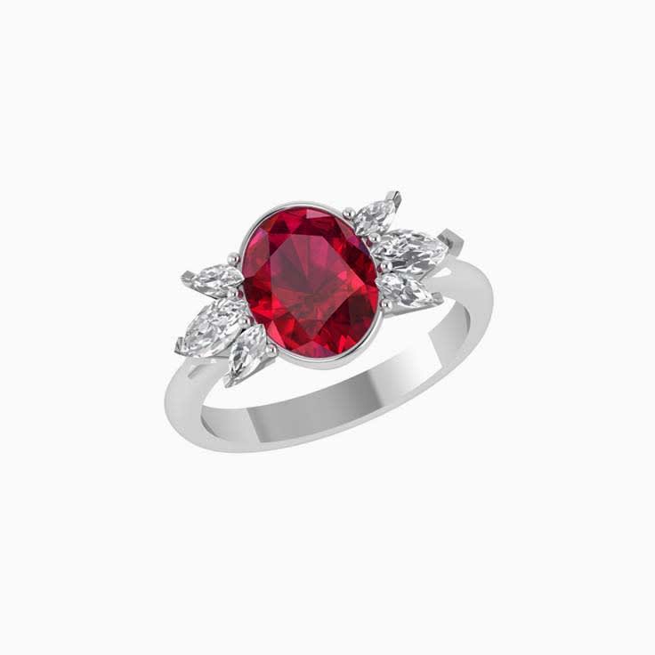 Oval ruby ring with marquise diamond