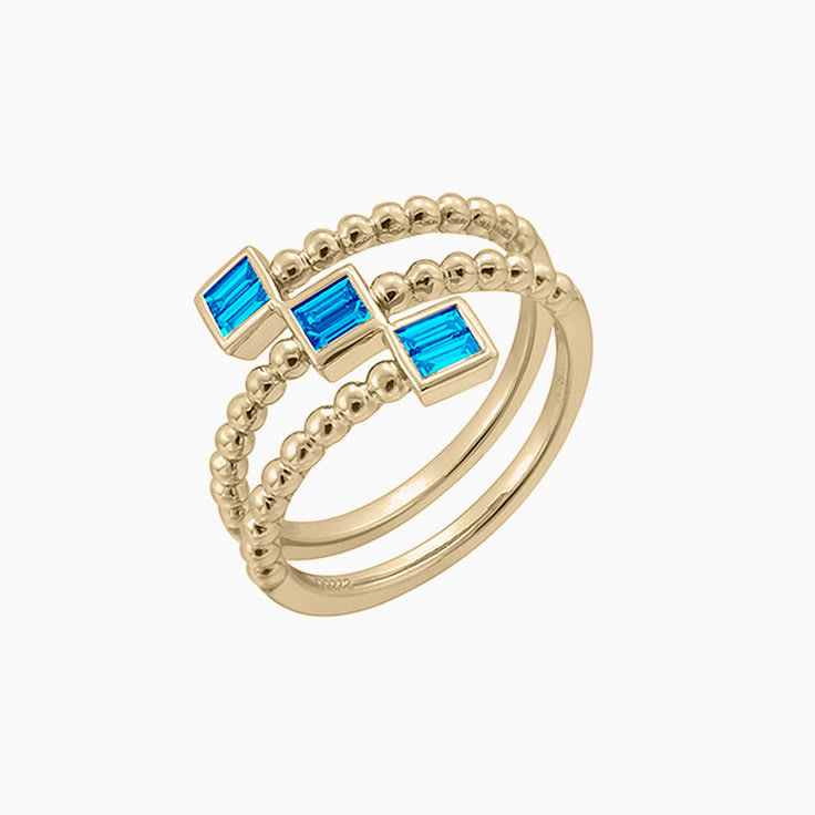 Swiss blue topaz wedding ring