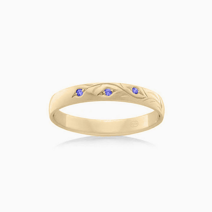 Tanzanite Hand engraved diamond wedder