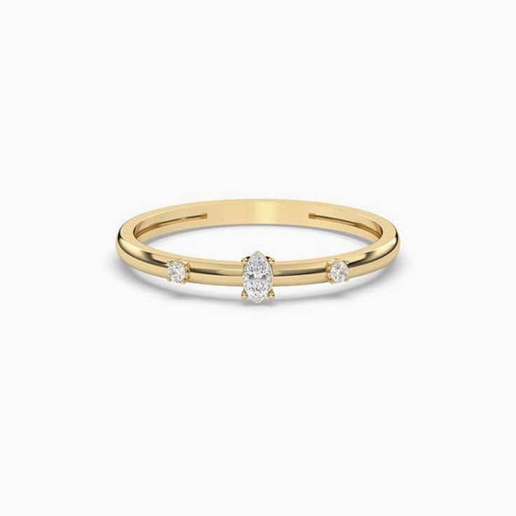 Marquise and round three stone petite ring