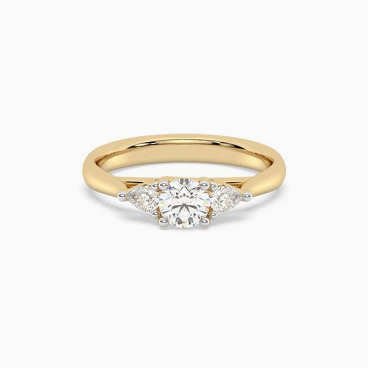 Half carat round trilogy ring