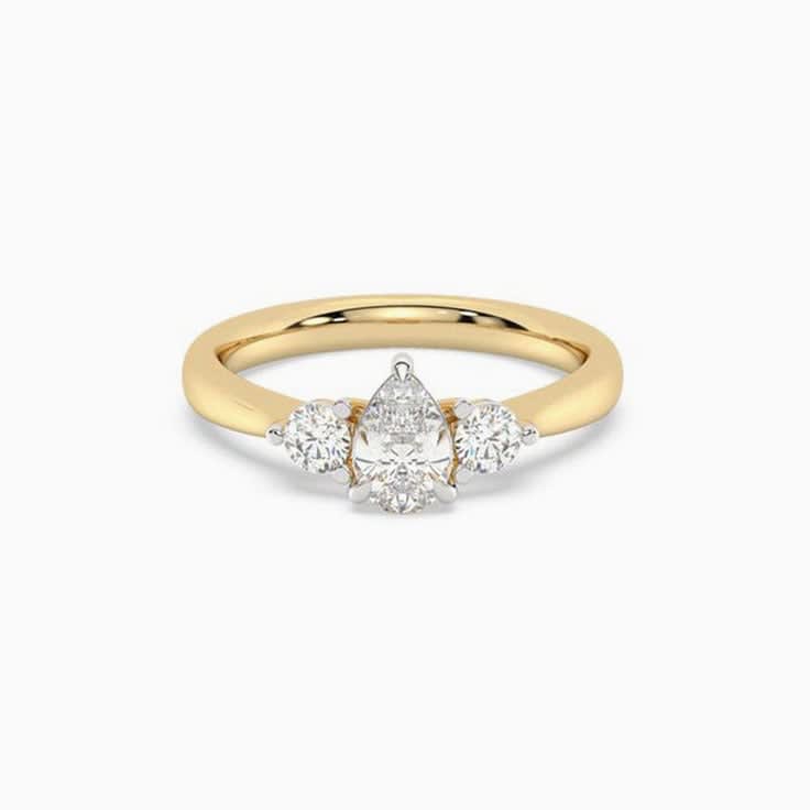 Pear trilogy with round diamond