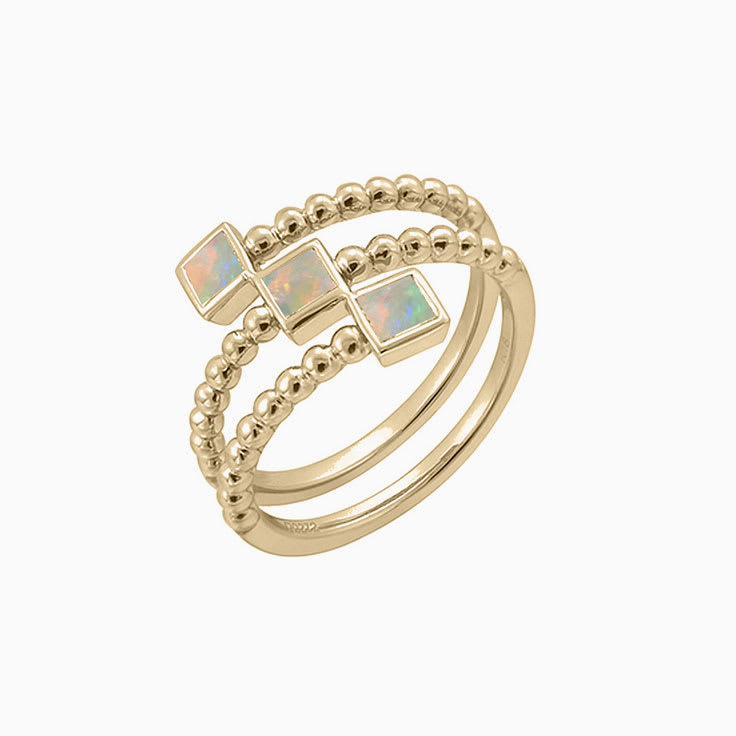 Opal Gold and Baguette diamond ring 3075