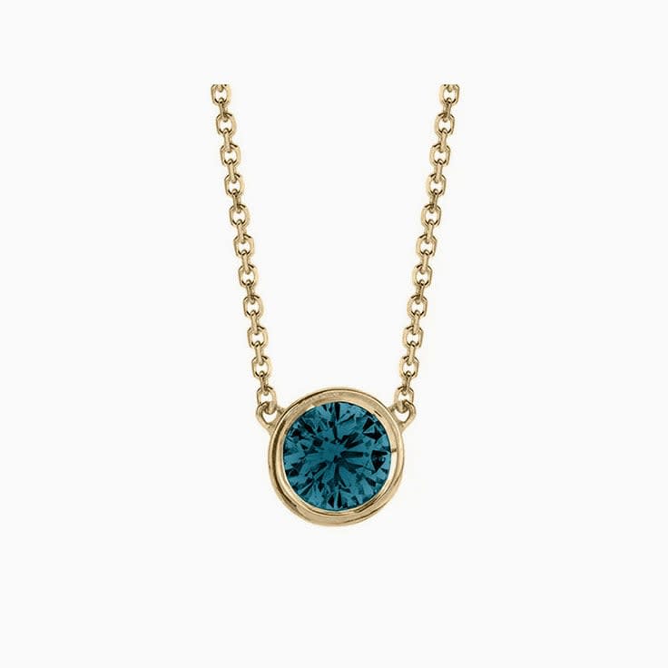 Teal Montana Sapphire Bezel set diamond pendant
