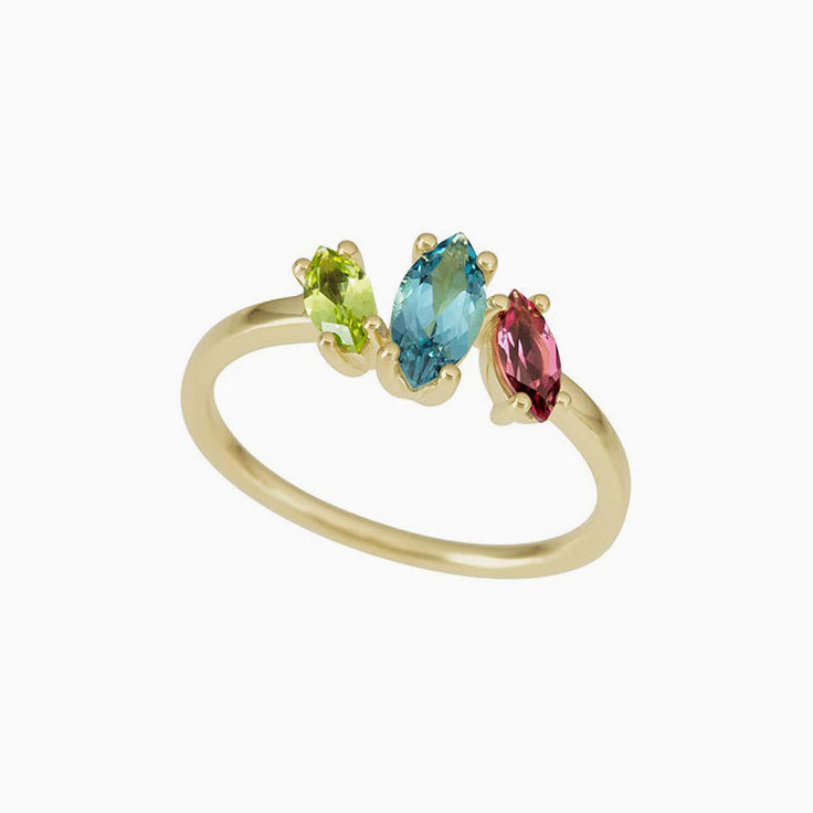 Peridot Rhodolithe and London Blue Topaz Ladies Ring in Yellow Gold