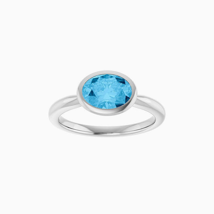 oval Swiss Blue Topaz Ring