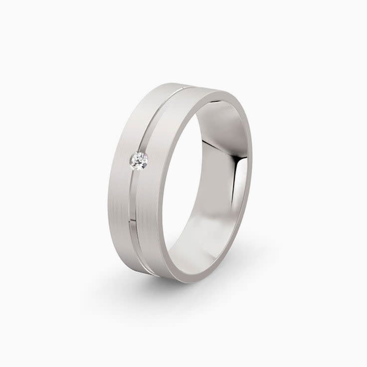 Diamond set on a center groove mens ring