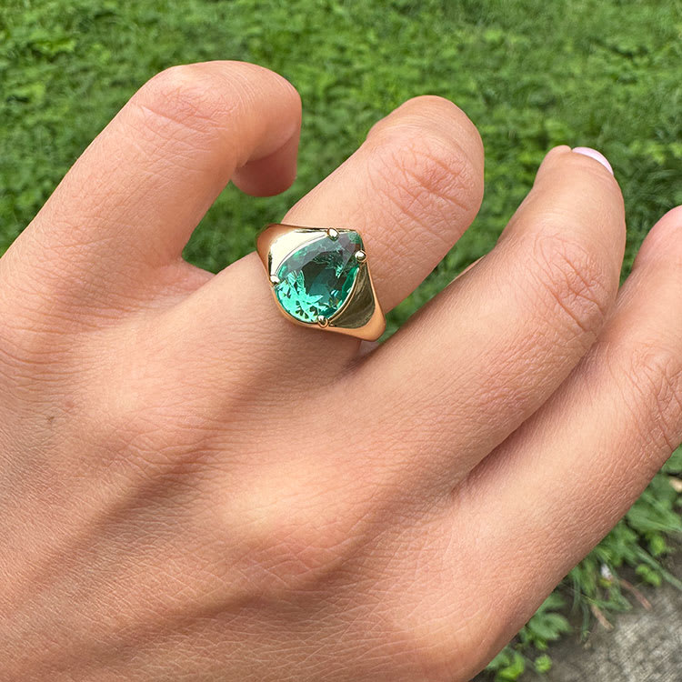 Green tourmaline and gold ring