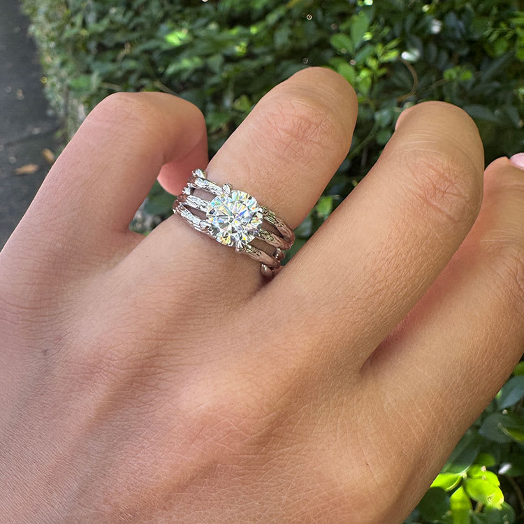 Natural round brilliant cut diamond on a unique gold band