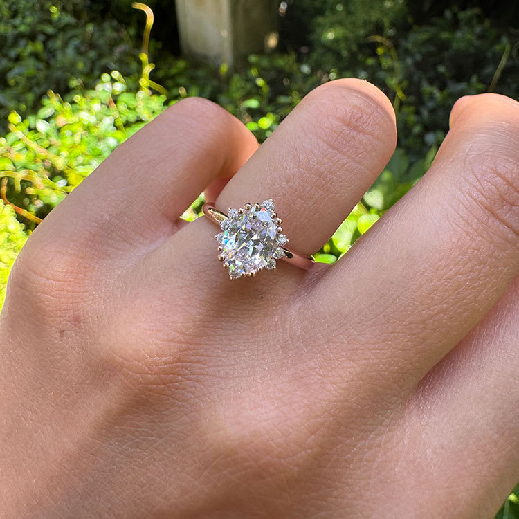 Natural oval diamond engagement ring with halo