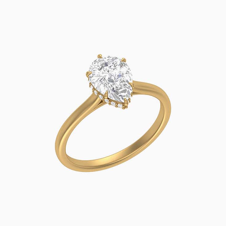 Pear cut lab solitaire with hidden halo