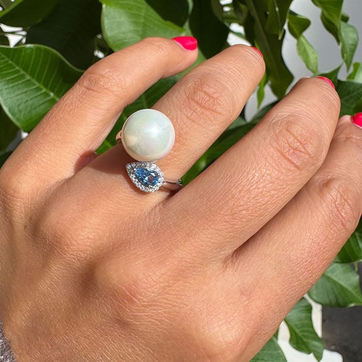 Pearl With A Blue Topaz Ring