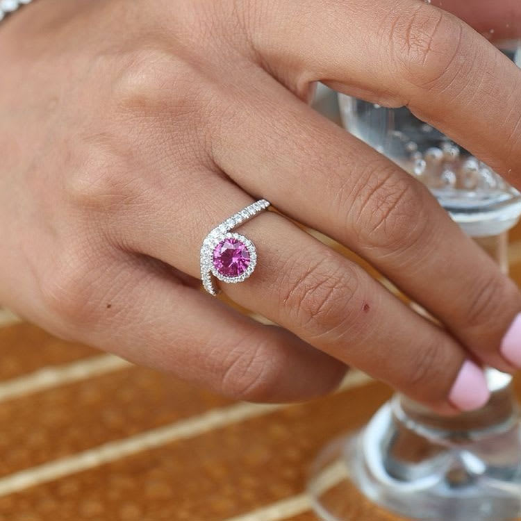 Round pink tourmaline with diamond