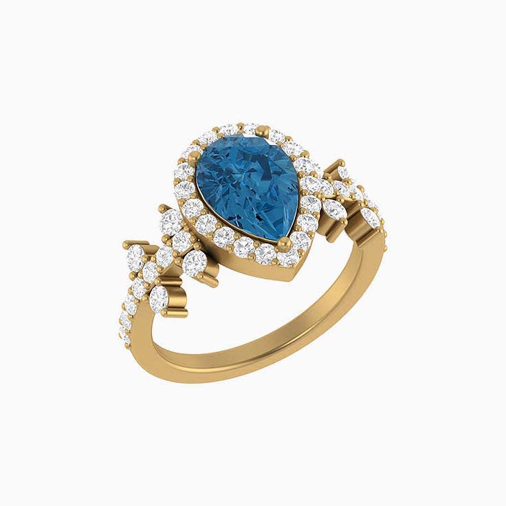Pear cut London Blue Topaz with natural diamonds