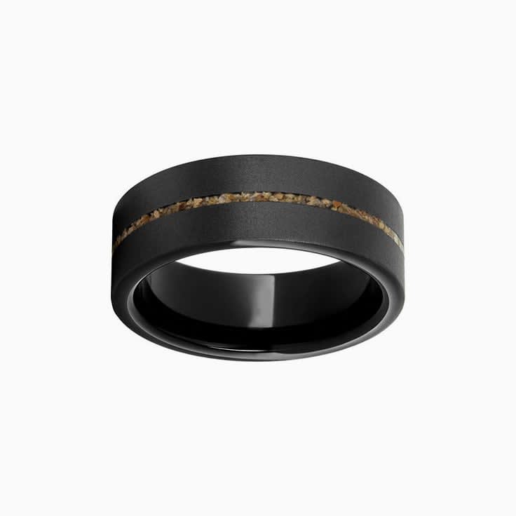Brown sand inlay in zirconium