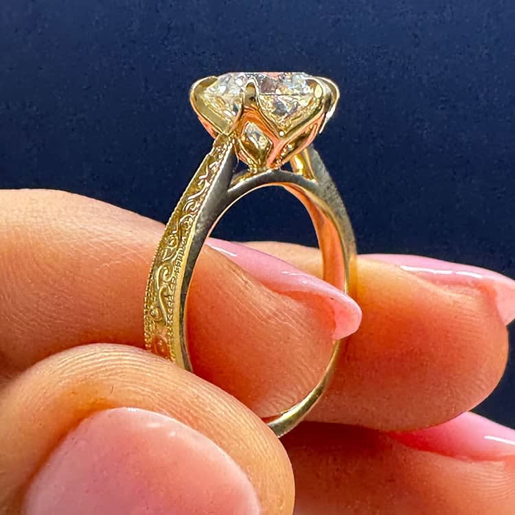 3 carat round brilliant cut in vintage tulip setting