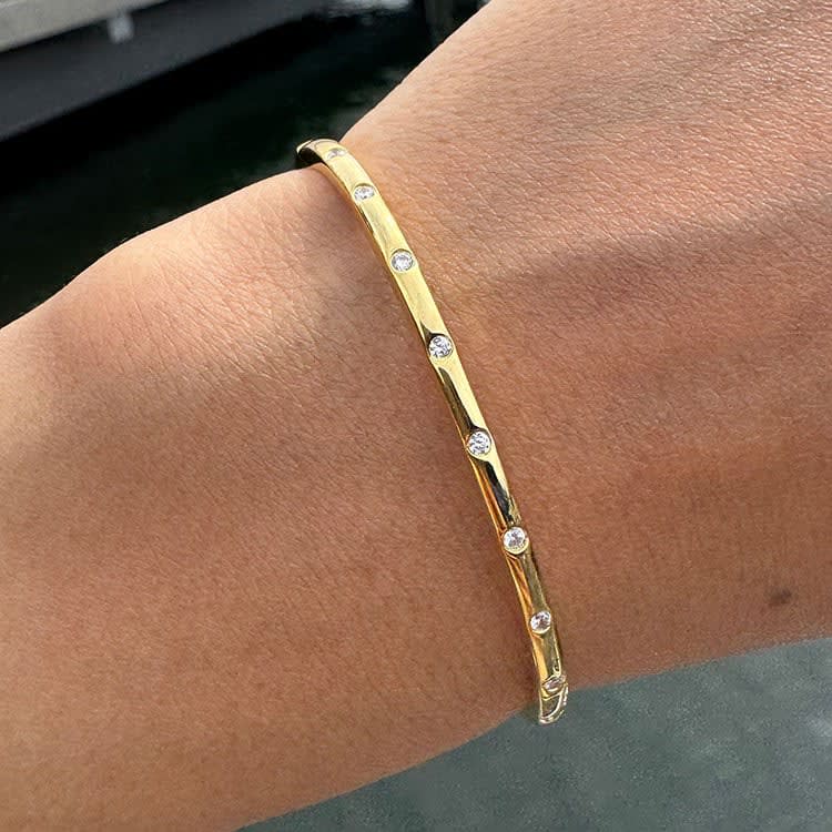 Drop set fine diamond bangle