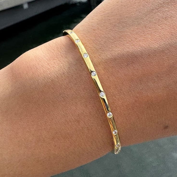 Drop set fine diamond bangle