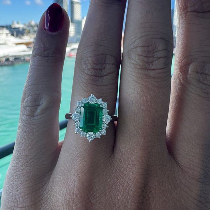Lab green emerald and diamond ring White gold