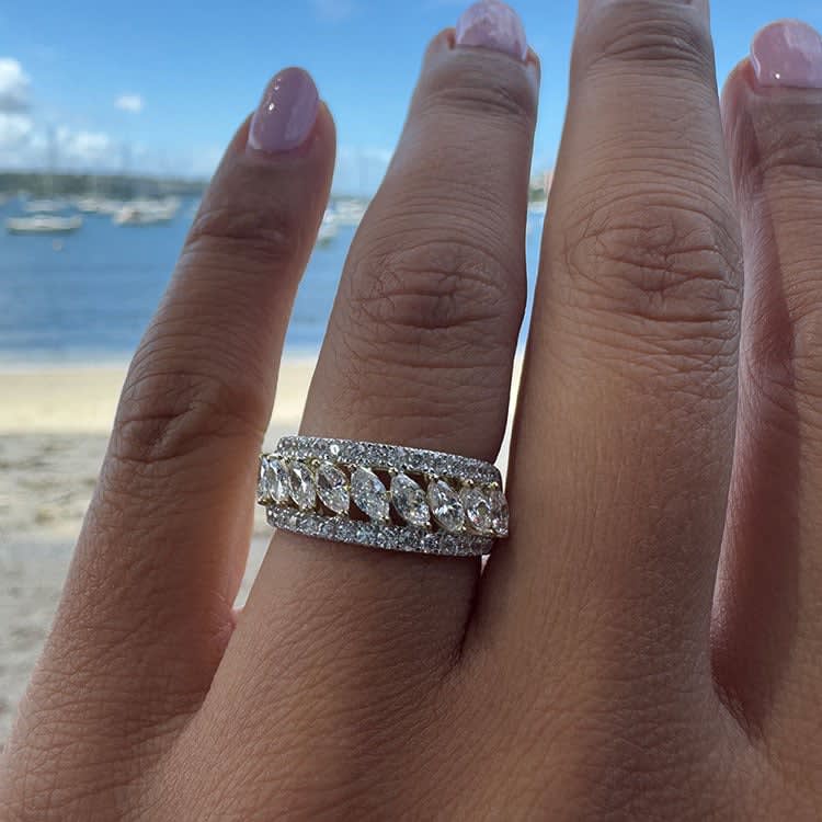 Unique round and marquise diamond ring