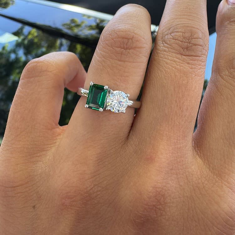 Lab diamond and green emerald toi et moi engagement ring
