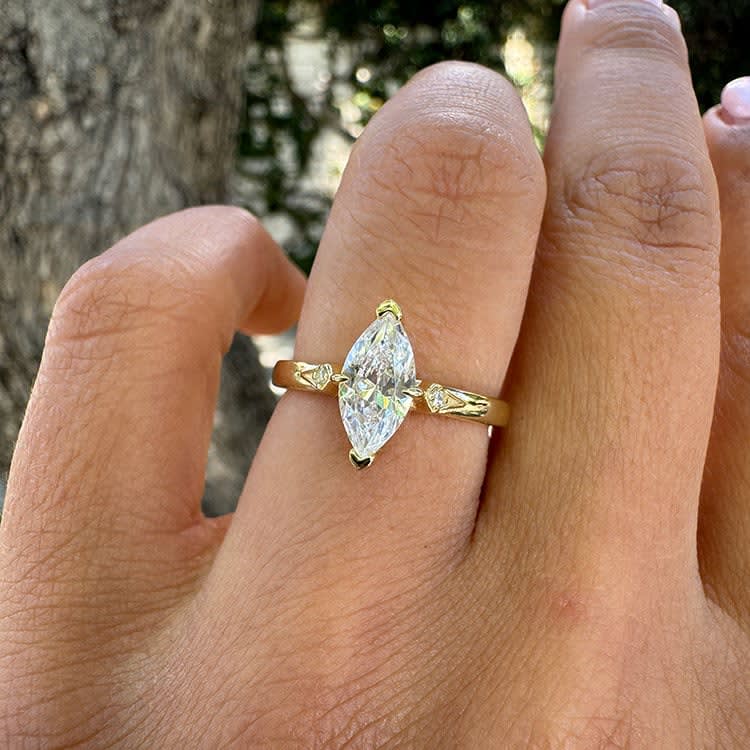 Marquise solitaire engagement ring Gold