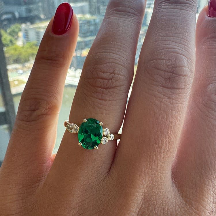 Lab oval green emerald and diamond ring