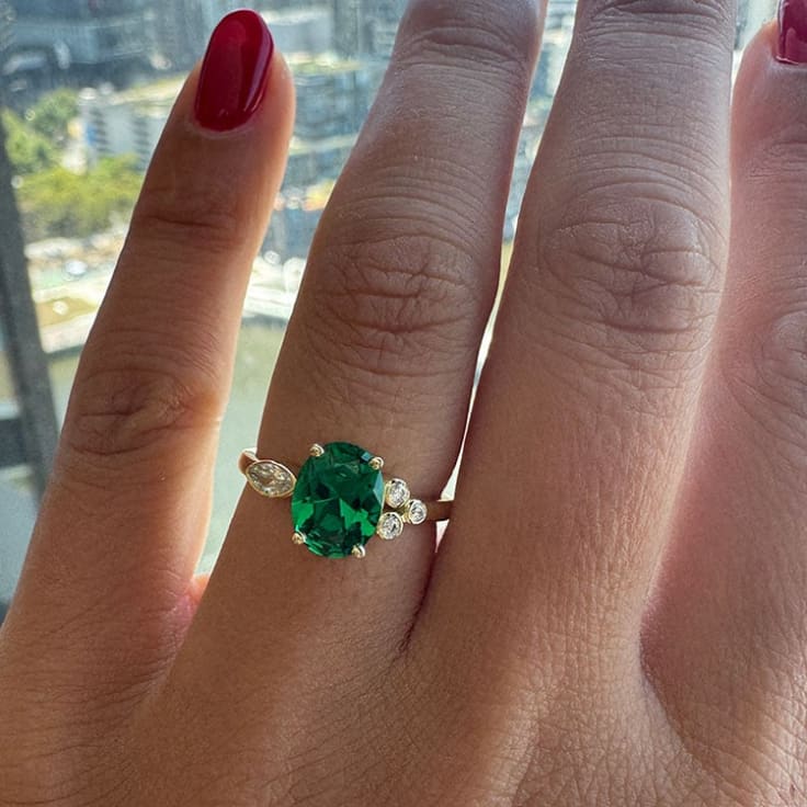 Lab oval green emerald and diamond ring