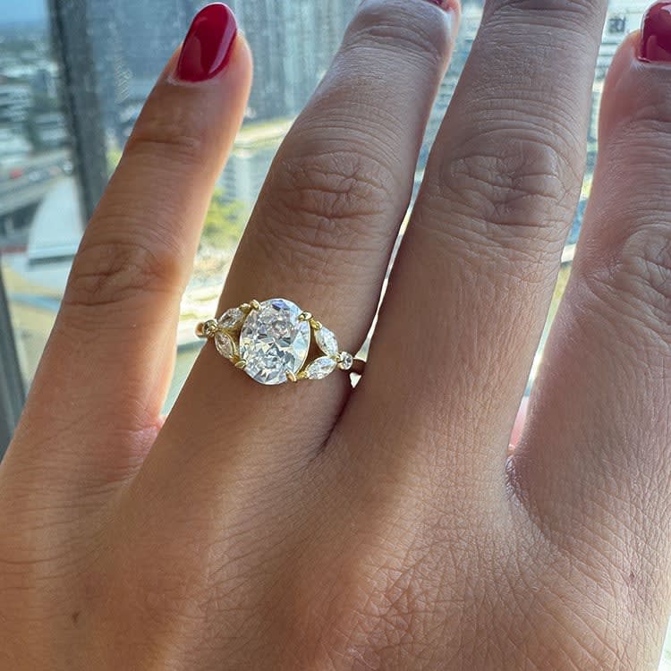 Oval cut engagement ring with lab diamonds