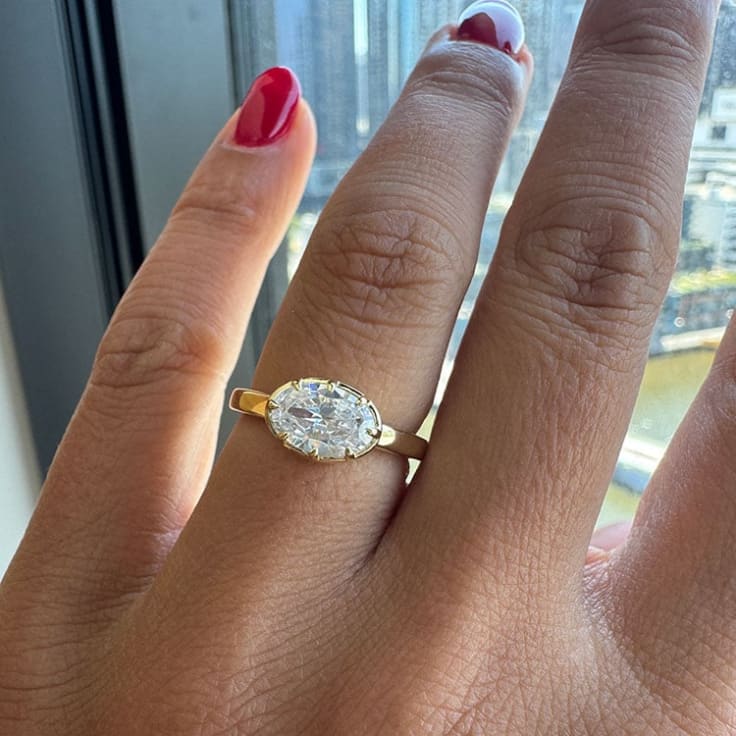 Oval east west solitaire ring