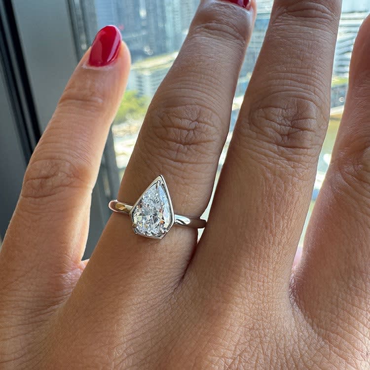 Pear cut diamond set in low setting