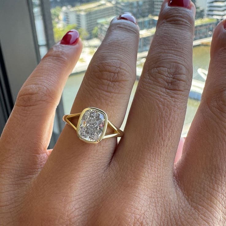 Bezel set cushion cut diamond