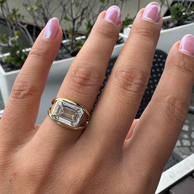 5ct east west emerald cut engagement ring