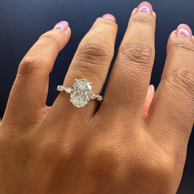 Oval diamond on a marquise cut band